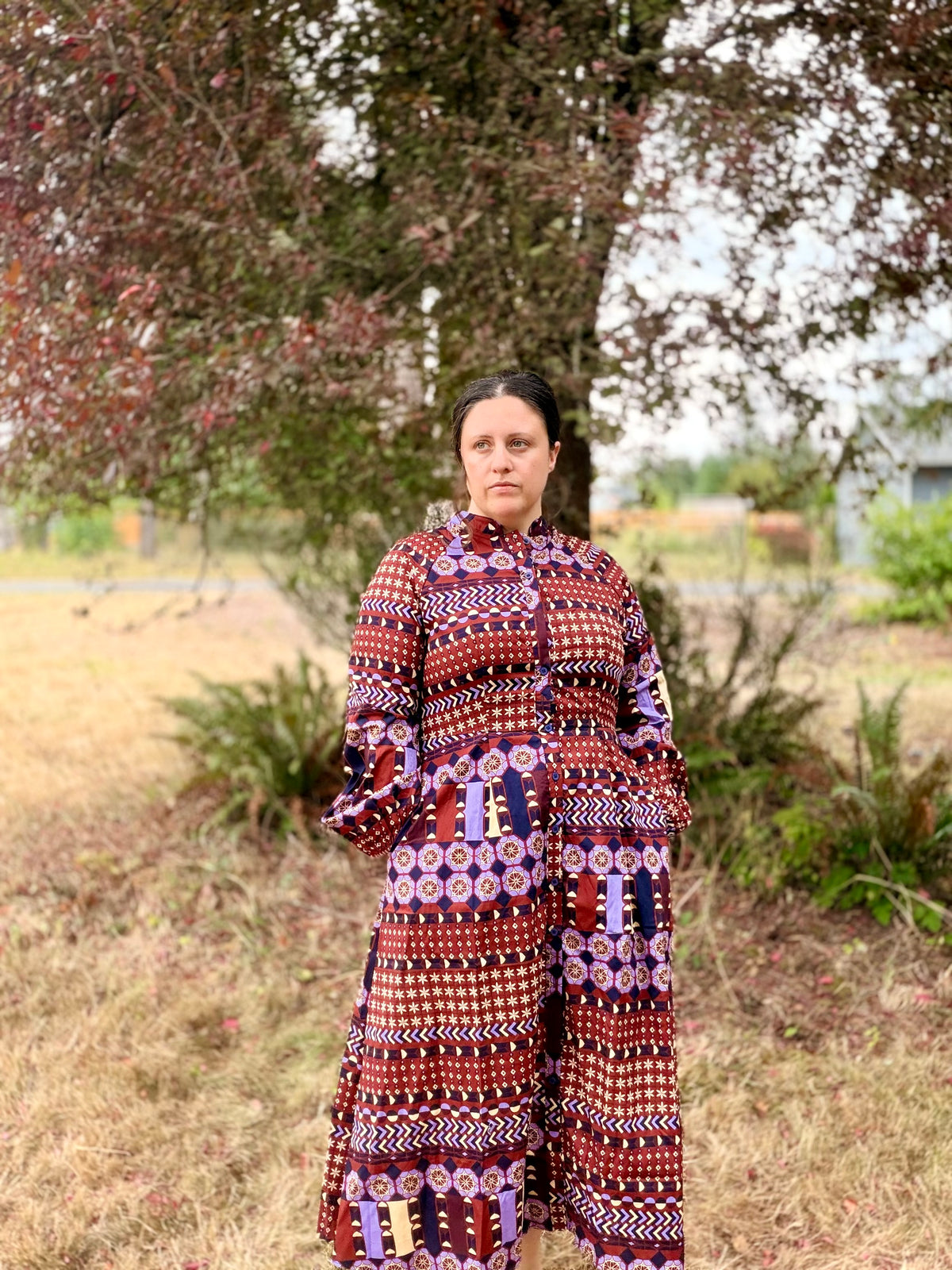 EXCLUSIVE BORDER PRT BTTN DWN PLEATED WST LAYERED MIDI DRESS