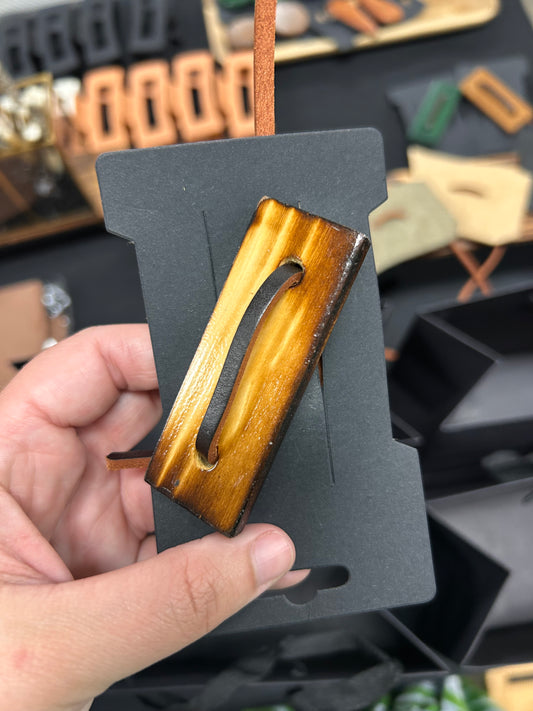 Wood clips/leather pieces
